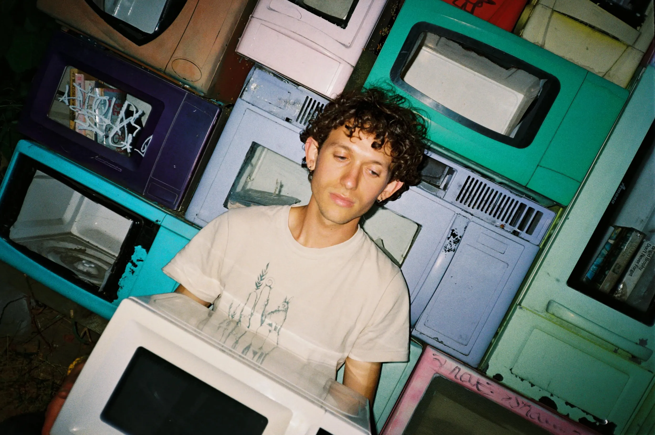 I am posing dramatically surrounded by microwaves